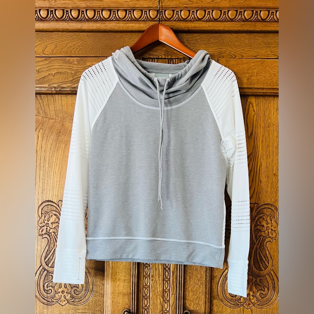 Athleta women’s gray/white hoodie with eyelet sleeves and back